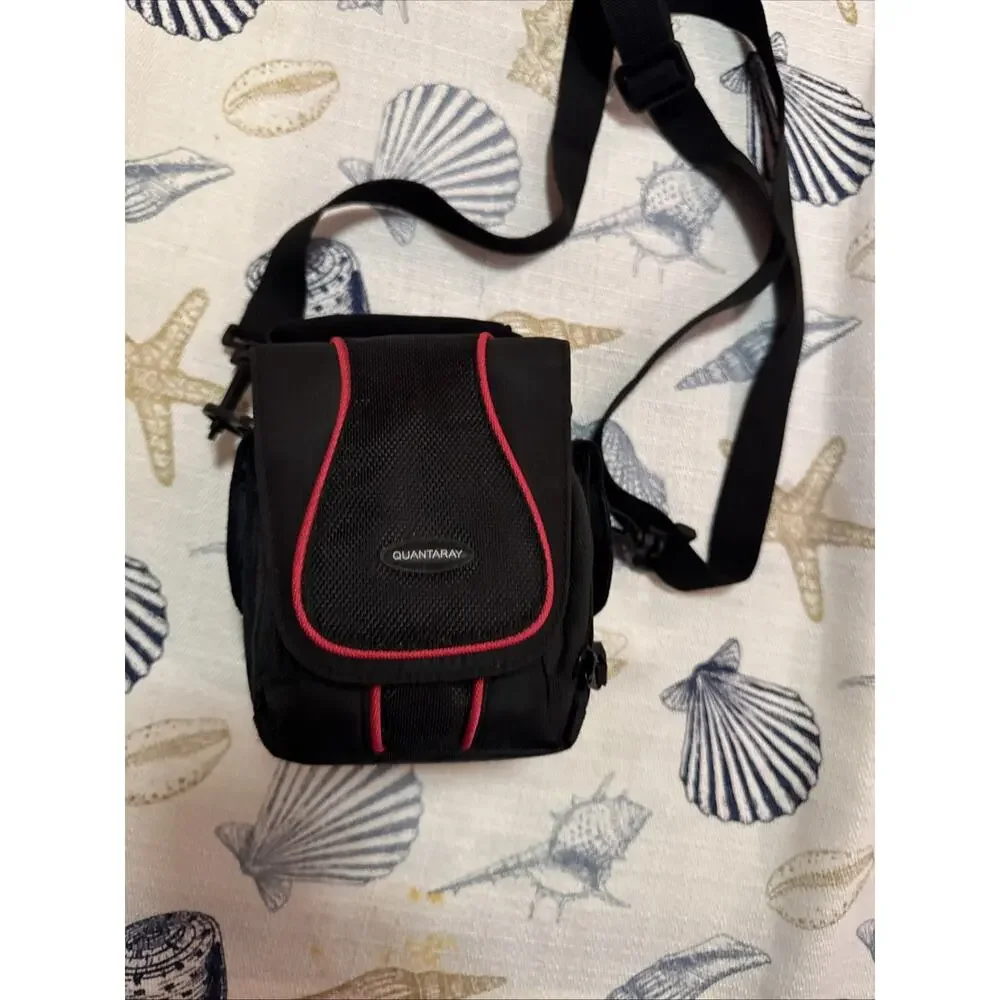 Nikon Black Camera with Matching Black Carry Case and Red Trim